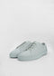 A pair of ML0034 Grey Floater sneakers, handcrafted in Portugal, with white laces, positioned straight and close together on a plain white background.