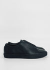 A pair of ML0084 Vegan Black sneakers with a sleek design, handcrafted in Portugal using premium Italian leathers, shown against a plain white background.