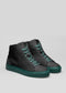 A pair of MH0006 Pixel Boss high-top sneakers with a dark gray upper and vibrant teal soles, displayed against a light gray background.