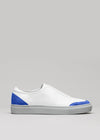 White leather sneaker with V14 Electric Blue W/ Lilac accents on the heel and toe, displayed against a grey background.
