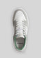 Top view of a single V2 Grey W/ Forest Green low top sneaker with white laces and green interior, displayed on a plain gray background.