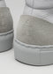 Close-up of the heels of two V7 Grey Floater high top sneakers with textured details and "fieu" embossed on the heel counters.