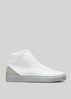 V39 White W/ Grey high-top sneaker with a textured upper, gray suede heel cap, and a thick white rubber sole, displayed against a light gray background.