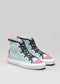 A pair of TH0006 by Rita in pink, blue, and white colors with black laces on a gray background.