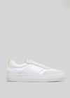 Side view of a V3 White & Bone low-top sneaker with a textured toe and a small yellow tab detail on the heel.