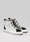 A pair of TH0010 by Letícia high-top sneakers, white with black accents, displayed against a gray background.