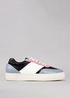 A side view of N0003 by Márcia featuring pastel pink, blue, and black panels with white laces and a thick sole, displayed against a gray background.