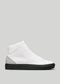 A MH0113 by Braima with a black sole, featuring a minimalist design and smooth texture, handcrafted in Portugal from premium Italian leathers.