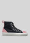 The TH0016 by Ude features a black premium canvas upper and soft suede accents, pink details on the toe cap, heel, and rear pull tab, grey laces, white midsole, all set against a grey background. Handcrafted in Portugal for exceptional quality.