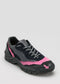 A black and pink L0015 by Becas with a rugged sole, crafted from premium Italian leathers and featuring gray laces, positioned against a light gray background.