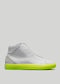 The V50 Grey W/ Yellow is a high-top sneaker, handcrafted in Portugal from premium leather, with a vibrant neon yellow sole set against a plain light gray background.