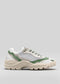 A single V21 Leather Color Mix Forest Green low-top sneaker with chunky soles displayed against a plain gray background.