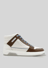The V12 Brown W/ Off White is a high-top sneaker with blue laces, handcrafted in Portugal from premium Italian leathers, featuring a rubber sole and stitched panel details, shown on a plain gray background.