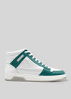 The V9 White W/ Emerald Green is a white and green high-top sneaker, handcrafted in Portugal from premium Italian leather, with a white sole, white laces, and emerald green accents on the toe, heel, and lace area—shown on a gray background.