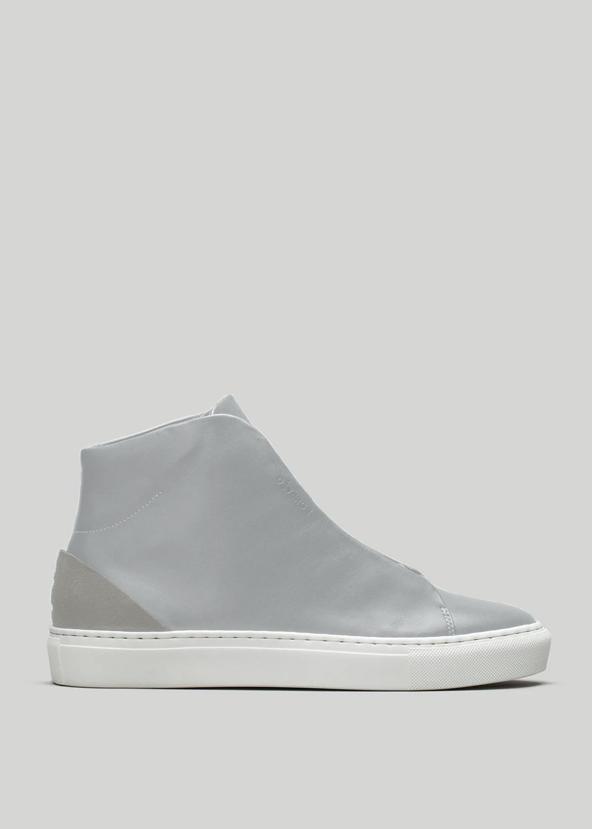 The V55 Light Grey W/ Bone is a gray high-top sneaker made of premium leather with a minimalist design, featuring a smooth finish and crisp white sole, displayed on a plain background.