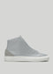 The V55 Light Grey W/ Bone is a gray high-top sneaker made of premium leather with a minimalist design, featuring a smooth finish and crisp white sole, displayed on a plain background.