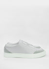 A single SO0018 Grey W/ White leather slip-on sneaker with a white sole, displayed against a plain white background.