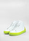 The MH0060 White W/ Lime sneakers are high-tops with vibrant yellow-green soles and heel tabs, handcrafted from premium Italian leathers, and set against a plain white background.