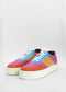 A pair of N0015 Pink & Orange low top sneakers with sections in pink, blue, orange, and beige, set against a plain white background.