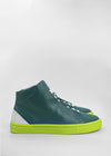 A pair of MH0080 Green W/ Yellow with teal custom leather uppers and bright green soles, displayed against a grey background.