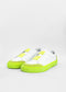 A pair of SO0021 White W/ Yellow slip-on sneakers on a plain white background.
