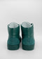A pair of MH0059 Emerald Green Floater boots with a low heel, viewed from the back, against a plain white background.