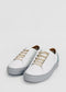 A pair of ML0080 White Floater W/ Grey, crafted from premium Italian leathers with beige laces and a grey sole, displayed on a plain white background. Handcrafted in Portugal and ethically made to order.