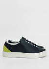 The ML0076 Black W/ Lime, ethically made to order with premium Italian leathers, featuring white soles and a bright yellow accent on the heel, displayed against a white background.