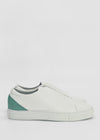 A ML0079 White Floater W/ Green, handcrafted in Portugal using premium Italian leathers, with a green suede heel accent against a plain white background.