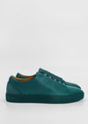 A pair of ML0071 Emerald Green Floater low-top leather sneakers with rubber soles, crafted from premium Italian leathers and displayed in a side view against a white background.