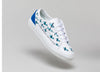 Custom low top sneakers with a design featuring birds by Diverge with manicomio partnering.