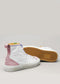 TH0024 by Iara: Premium high-top sneakers with white canvas, pastel pink accents, and sturdy rubber soles. One shoe stands upright while the other shows its gum sole. Expertly handcrafted in Portugal for exceptional quality and style.