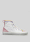 The TH0024 by Iara is a high-top sneaker crafted in Portugal with a premium white canvas upper, pink and purple accents, a multicolored toe, yellow ankle trim, and a crisp white sole.