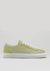 The V14 Sage W/ Lime is a light green leather sneaker, handcrafted in Portugal from premium Italian leathers, featuring white laces and a white rubber sole shown in a side view against a plain background.