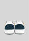Rear view of V15 sneakers in white with dark green and beige, crafted from premium Italian leathers, on a gray background.