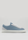 The V15 Teal W/ Bone is a classic sneaker in teal and bone, handcrafted in Portugal from premium Italian leather. It features white laces, a textured sole, suede heel detail, and is shown on a plain light background.