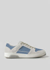 The V17 Lake Blue W/ Bone is a retro-future sneaker in gray and blue with a white sole, lace-up design, and subtle perforated detailing on the side. It's handcrafted in Portugal from premium Italian leathers.