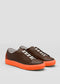 The V47 Brown W/ Orange sneakers feature handcrafted design with premium Italian leathers, white laces, and bright orange soles on a plain background.