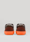 The V47 Brown W/ Orange features dark brown uppers crafted from premium Italian leathers and bright orange soles, viewed from the back.