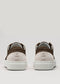 The V53 Brown W/ Bone sneakers, crafted from premium Italian leathers, showcase a distinct line and dot design on the heel, highlighting unparalleled style and quality.