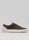 The V53 Brown W/ Bone slip-on sneaker features a white sole and light beige heel patch, handcrafted in Portugal, set against a gray background.