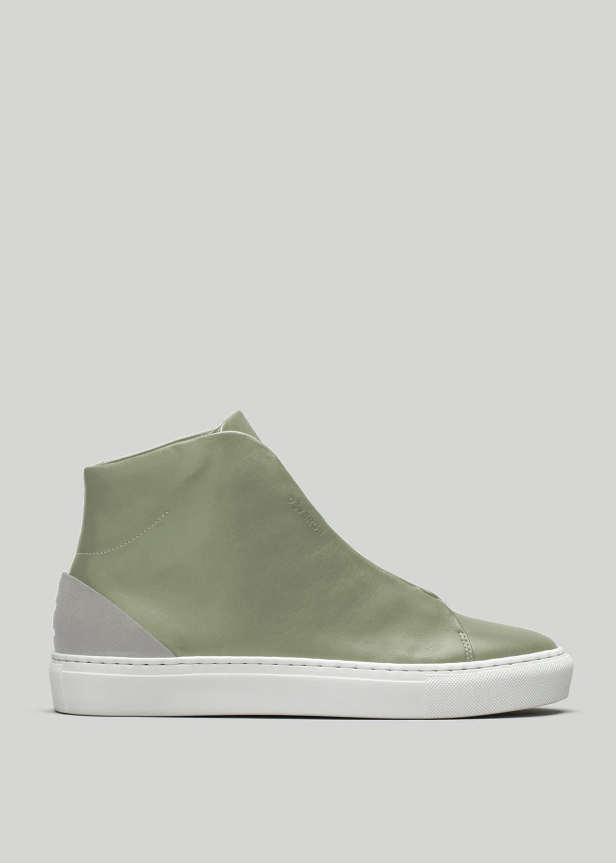 The V53 Pine W/ Plaster is a green high-top sneaker with a smooth finish and white sole, featuring light gray suede accents on the heel. Handcrafted in Portugal from premium Italian leathers, it offers both style and quality.
