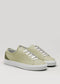 The V54 Sage Green W/ Olive sneakers are crafted from premium Italian leathers, featuring white laces and soles. Handcrafted in Portugal, this pair blends style and comfort and is displayed against a plain background.