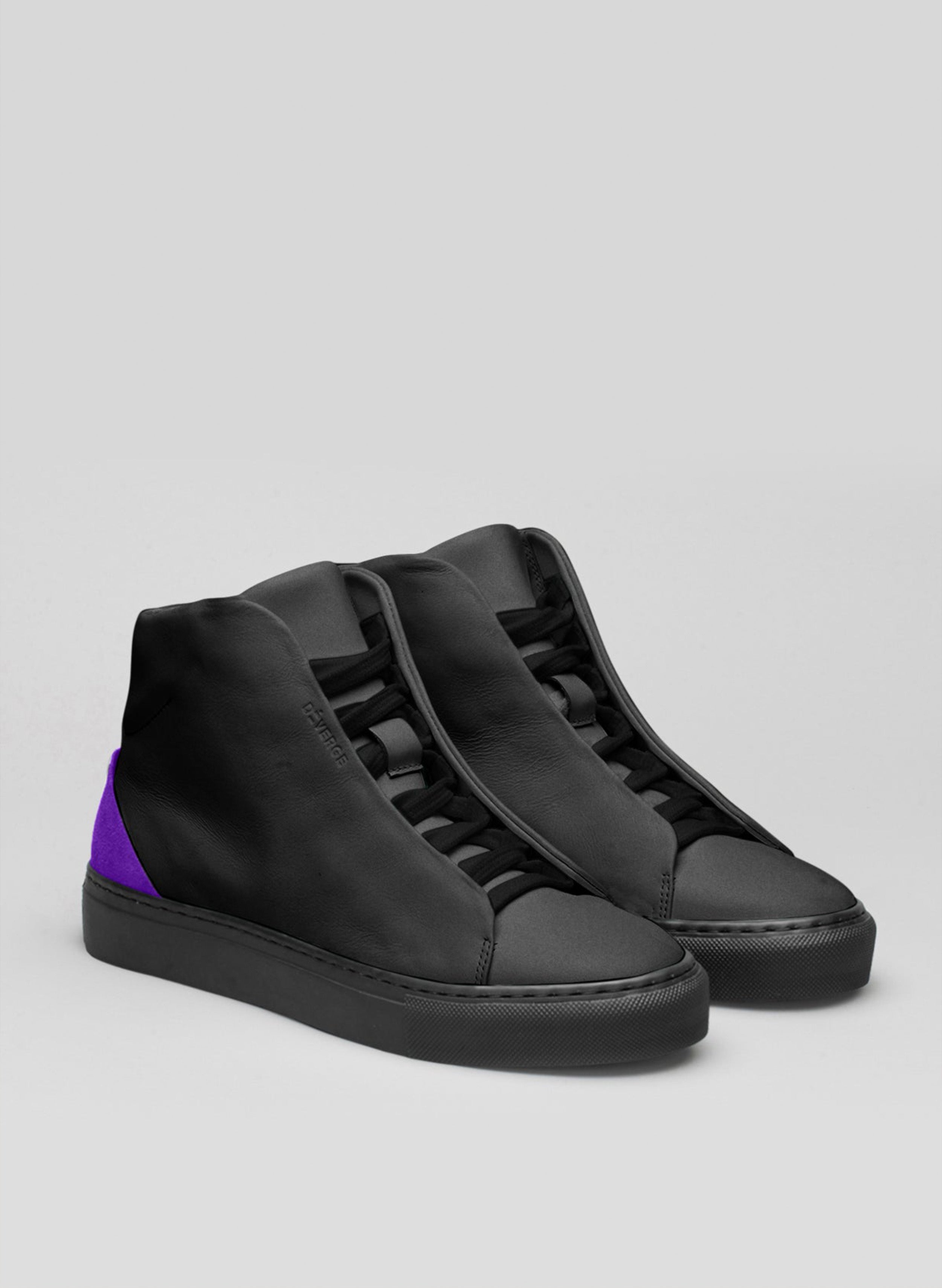 A pair of black and purple high top sneakers, showcasing custom shoes by Diverge.
