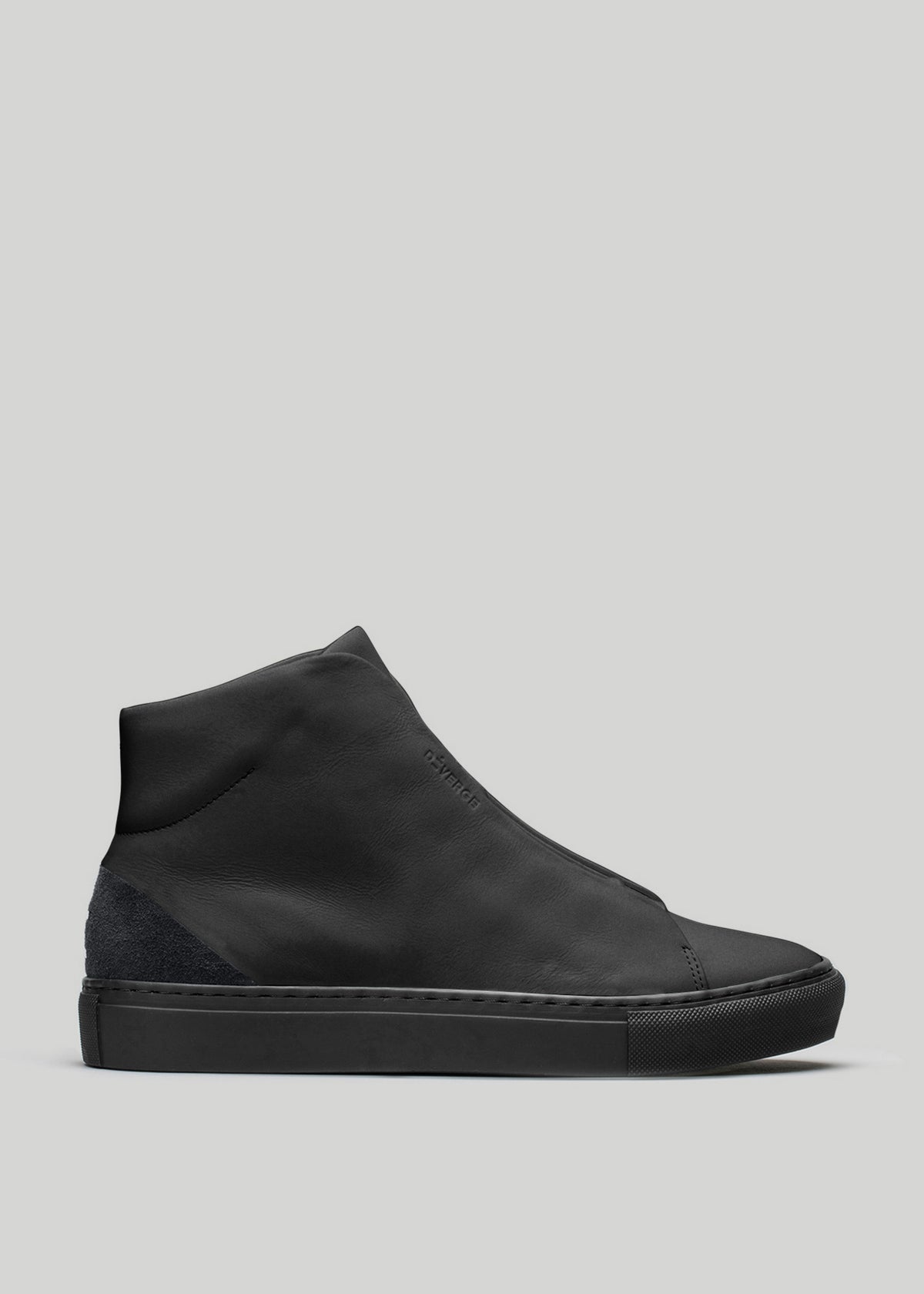 A single MH0014 Pyck's Kicks Black Canvas high-top sneaker with a smooth leather surface and suede heel detail, displayed against a plain light grey background.