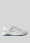 A single V6 Arctic Blue W/ White low top sneaker with red detailing and a blue sole, displayed against a light gray background.