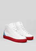 Un par de V28 Artic Blue W/ Red leather high-top sneakers sobre fondo gris.