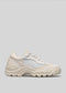 A single V10 Leather Color Mix Beige low top sneaker displayed against a plain light gray background.