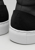 black premium leather high sneakers in clean design close-up materials