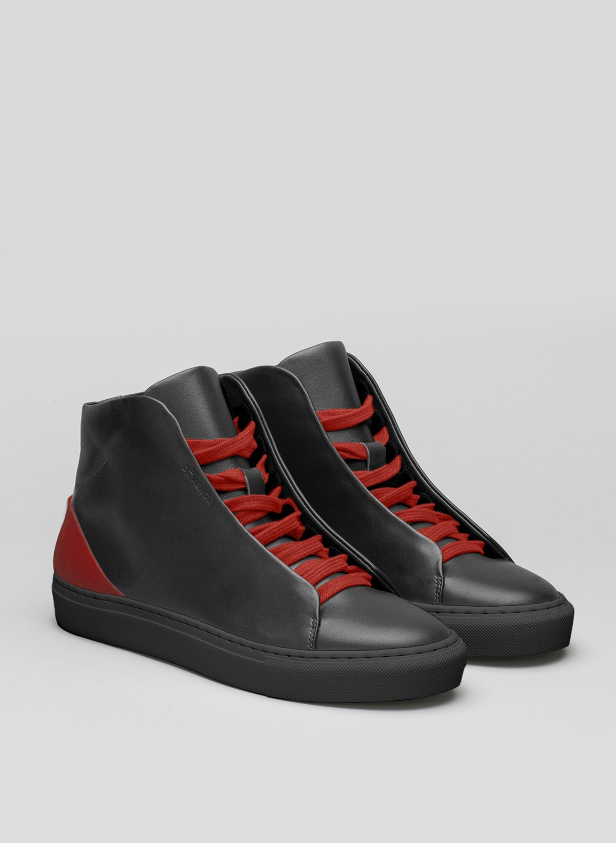 A pair of black high top sneakers with red laces, showcasing custom shoes by Diverge.